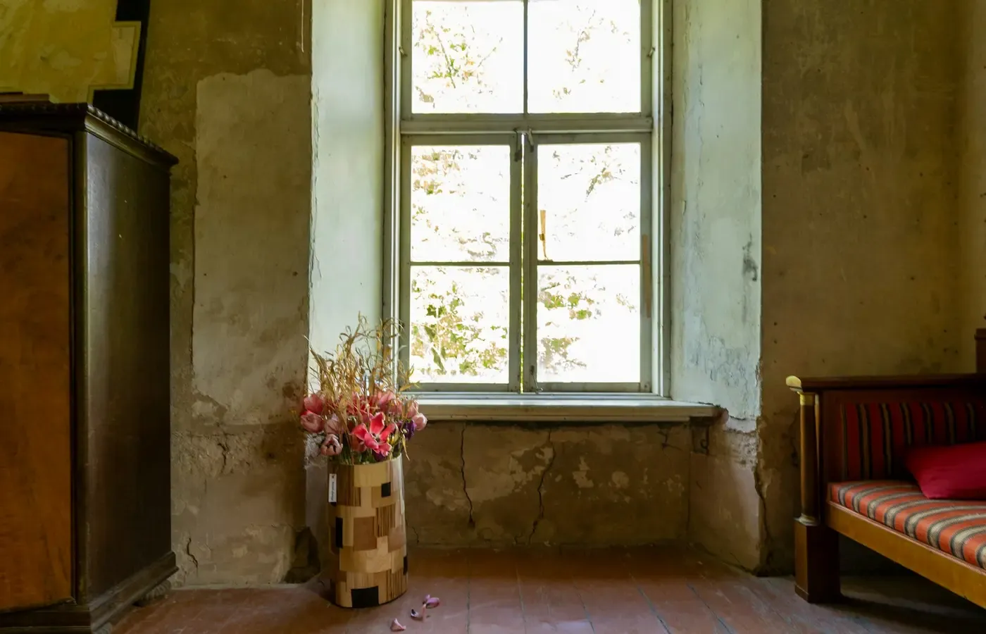 Sofa beside a sunny window