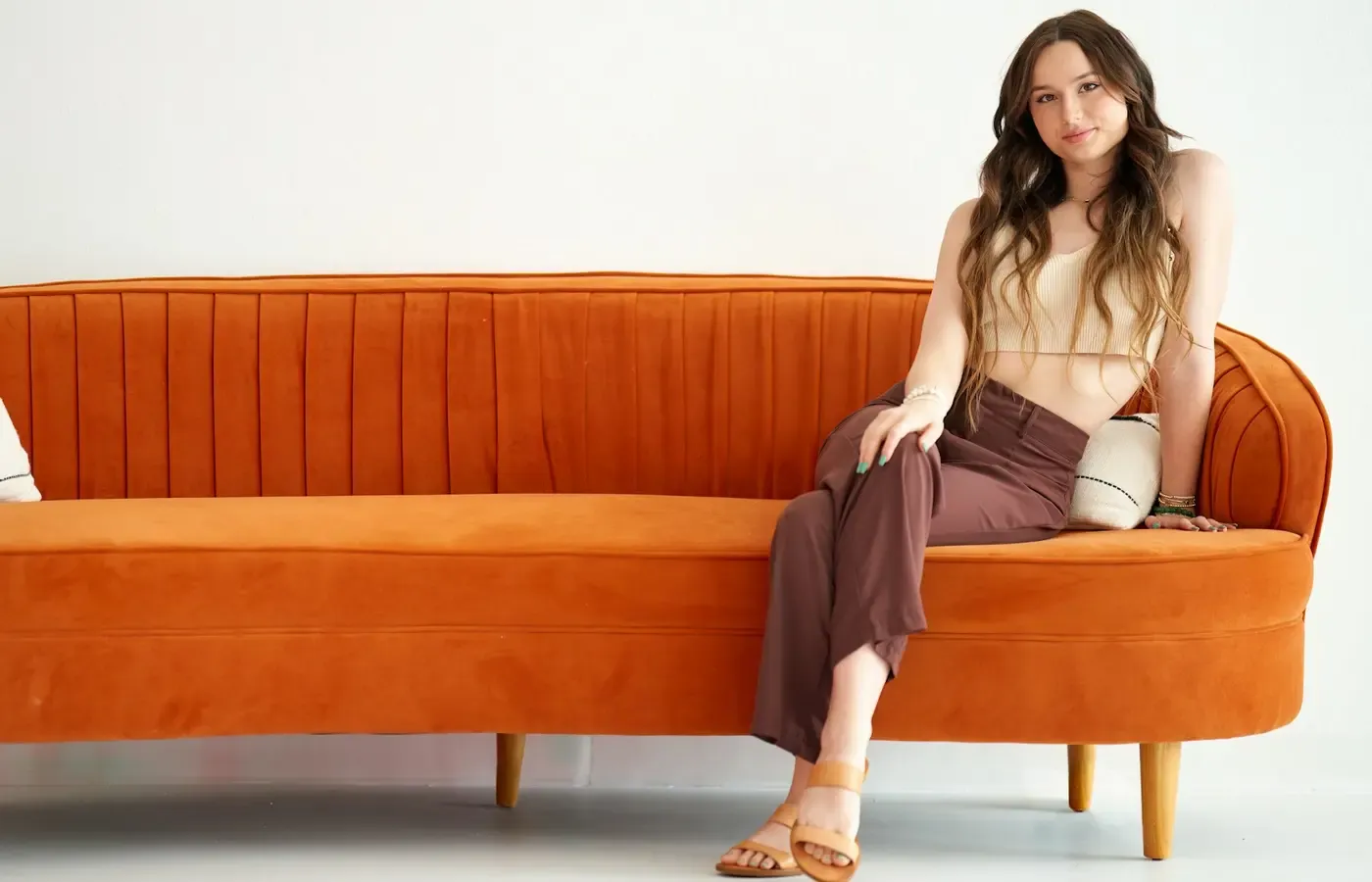 Person standing up from a sofa