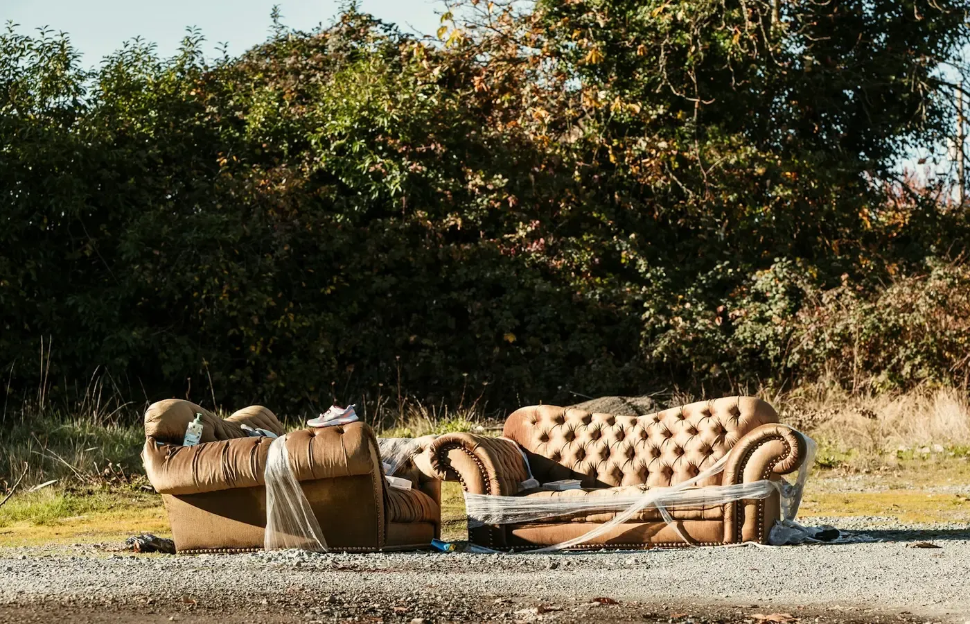 Inspecting a sofa delivery for damage, missing parts, and condition