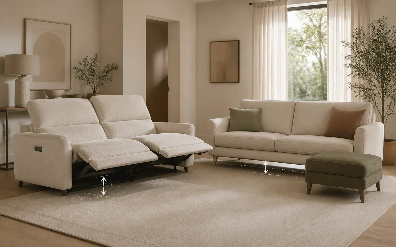 A power reclining sofa shown open beside a streamlined fixed sofa in a modern living room